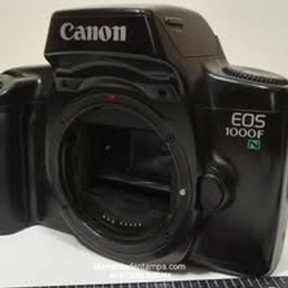 Canon EOS 1000F N 35mm SLR film camera body in black.
